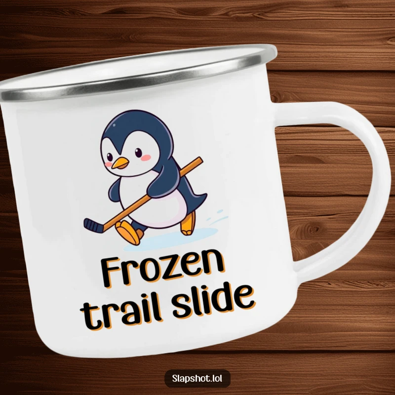 Funny penguin character sliding on ice with a hockey stick on a sturdy camping mug for winter lovers.