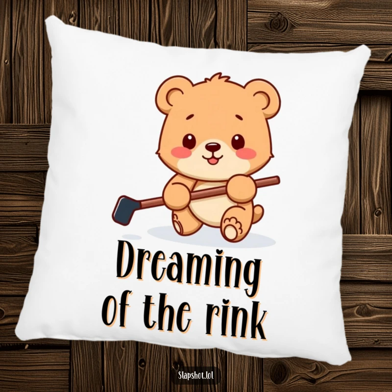 Funny decorative pillow featuring a happy bear cub with a hockey stick playfully batting a puck, offering cozy sports-themed comfort.