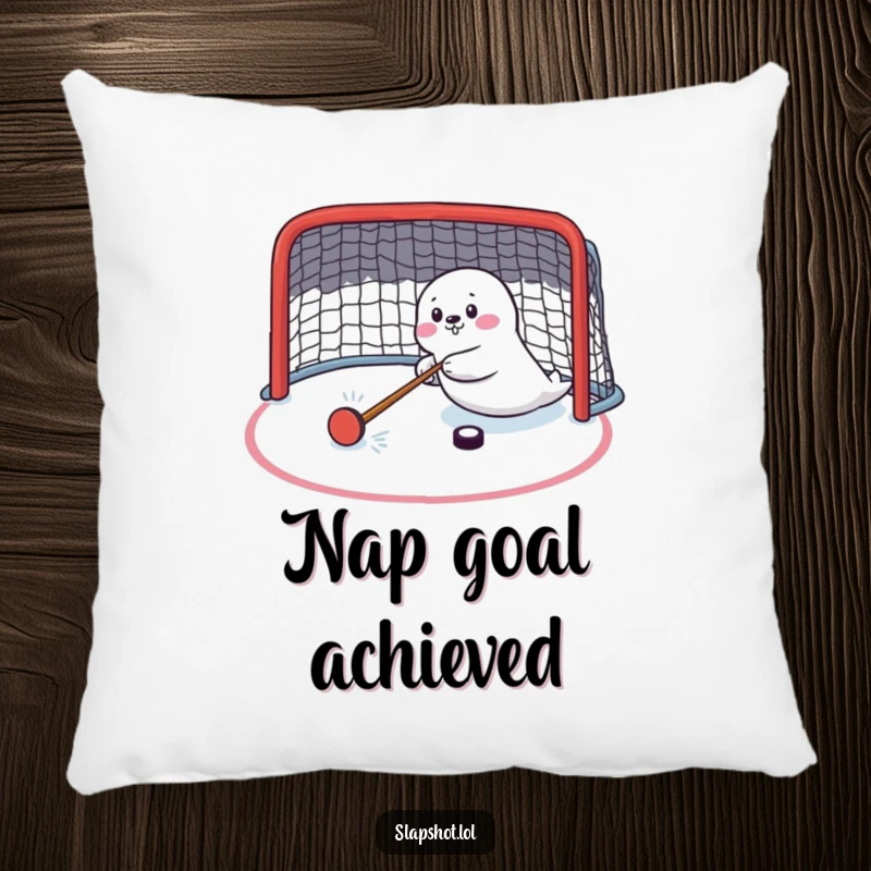 Funny seal character on a pillow, comically shooting a hockey puck, ideal for a comfortable and humorous space.