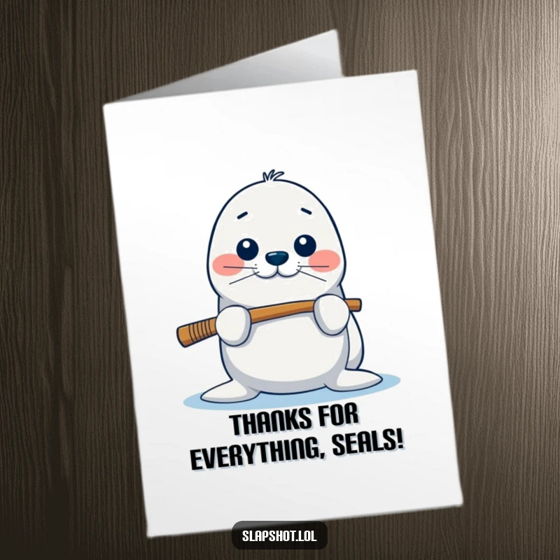 Funny Free Printable Thank You Card: A playful seal balances a hockey stick on its nose, offering a funny thank you.
